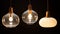 Different modern streamlined chandeliers. translucency, transparency and lighting