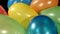 Different multicolored balloons, rotation, on