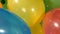 Different multicolored balloons, rotation, close
