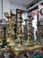 Different Old Brass candlesticks in flea market Second hand shop