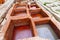 Different old stone vats with red dye for leather at Tannery of Tetouan Medina.