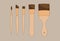 Different paint brushes isolated on brown background. Art tools set vector illustration
