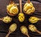 Different pasta types in wooden spoons on the table. Top view.