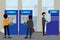 Different People and ATM bank terminals,human profile and back view