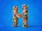 different pills stack in shape of letter H.