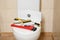 Different plumber`s tools on toilet seat lid