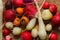 Different root vegetables on a wooden board