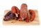 Different salami on a white background