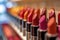 Different shaded lipsticks in a row on display in store