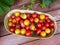 Different shaped and colorful cherry tomatoes in a bowl