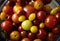 Different size of tomatoes in a bowl