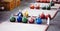 Different sizes of kettlebells weights lying on gym floor, platform for competition