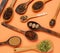 Different spices in spoons colorful background. Flat lay or top view