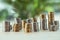 Different stacks of coins standing on table