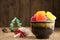 Different sweet candies on rustic wooden table