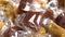 Different toffee candy close up. Wrapped taffy candies. Christmas treats