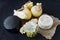 Different types of cheese on a black background. Cheese platter