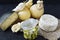 Different types of cheese on a black background. Cheese platter