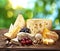 Different types of cheese over old wooden table.