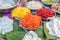 Different types of colorful garnish pan masala used to decorate betel leaf banarasi paan with selective focus