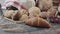 Different types of fresh baked Dutch bread is on the wooden table.