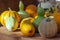 Different types of pumpkin on a wooden table. Rural still life