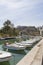 Different types of yachts anchored in Piraeus dock