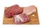 Different uncooked boneless meat on cutting board on white background