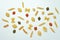 Different uncooked pasta on white background, top view