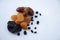 Different useful dried fruits on a white background. Prunes, dried apricots, dates and raisins. Appetizing picture for fruit