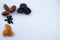Different useful dried fruits on a white background. Prunes, dried apricots, dates and raisins. Appetizing picture for fruit