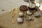 Different watches and cogwheels, gearwheels in steampunk style on a table