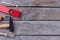 Different working tools on rustic wooden boards.