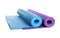 Different yoga mats on white background