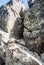 Difficult hiking trail secured by chain on Tri kopy peak in Western Tatras mountains in Slovakia