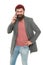 Difficulties mobile communication. Man bearded hipster hold mobile phone white background. Hipster smartphone call