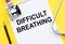 Difficulty breathing - the word is written on a wooden board. Shortness of breath text on medicine background. Respiratory disease