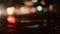 Diffused background with blurring lights of cars on the road of a big city.