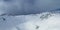 diffused light on the ridge of the hahnenkamm mountain with fresh snow