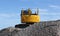 Digger excavator on the beach