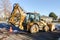 Digger parking on the street