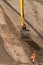 Digger works at new road construction site