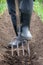 Digging spring soil with shovel