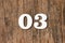 Digit zero three - White numbers on rustic wooden background