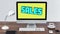 Digital animation of blue sales text bouncing against yellow background on computer screen on wooden