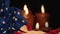 Digital animation of crumpled American flag against lit candles