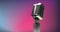 Digital animation of microphone against pink and blue gradient background