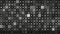 Digital animation of mosaic pattern wall, seamless loop. Motion. Monochrome blinking squares with small dots in the