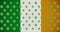 Digital animation of multiple clover leaves moving against irish flag