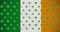 Digital animation of multiple clover leaves moving against irish flag